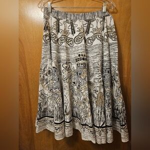 Moda International Black and Gold Patterned A-Line Skirt. Aztec Mexican Inspired